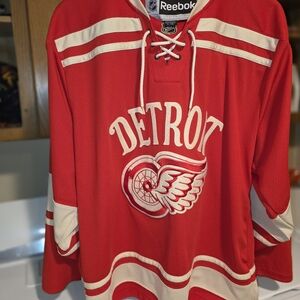 NHL Official License Reebok Red and White Detroit Hockey Jersey. HOWARD